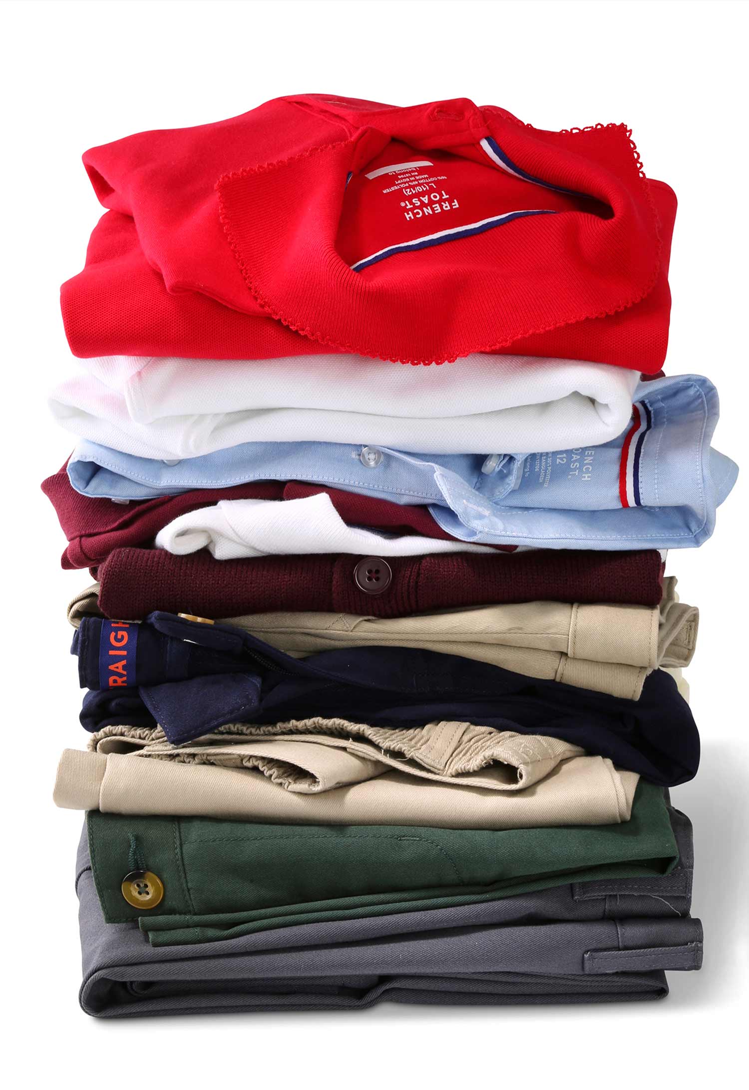 Stack of French Toast polos, pants, shorts