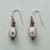 TETHERED PEARL EARRINGS view 1