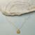 MAYA ANGELOU LEGACY GOLD GRATITUDE NECKLACE view 1
