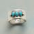 TURQUOISE TRINITY RING view 1