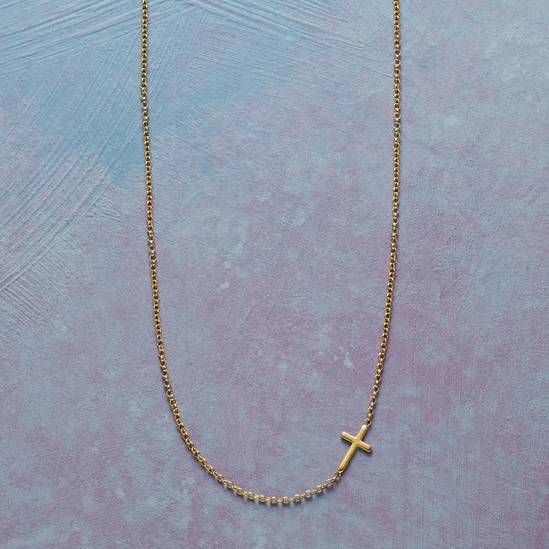 GOLD CROSS ACROSS NECKLACE view 1