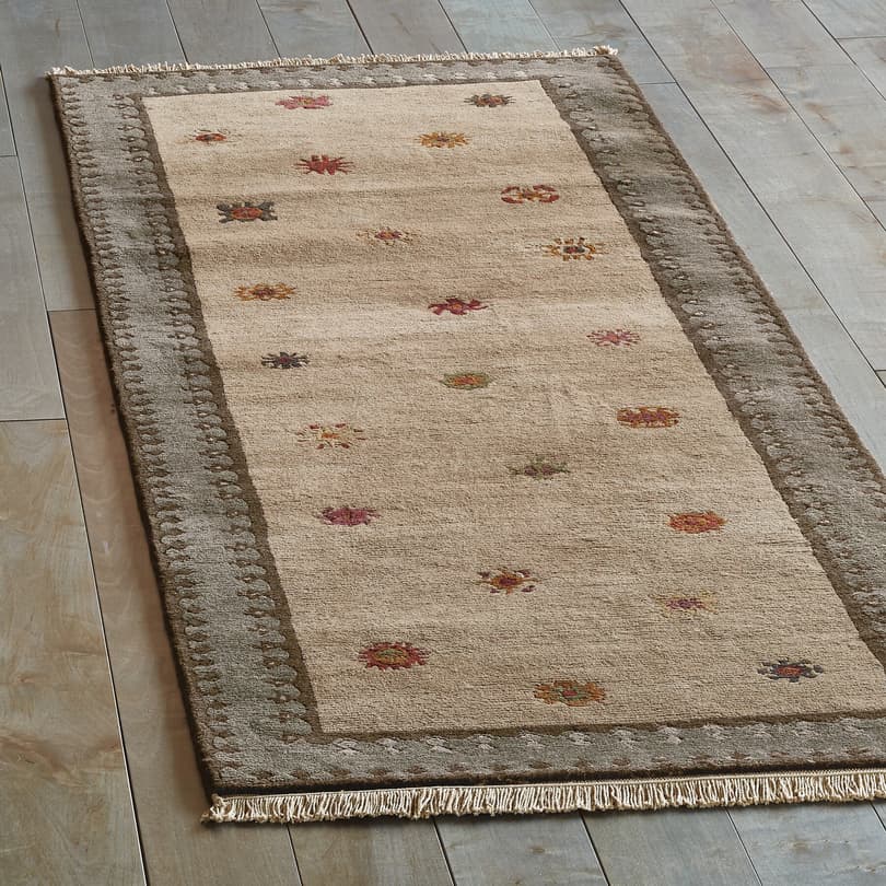 TIBETAN SUN HAND-KNOTTED RUG view 1