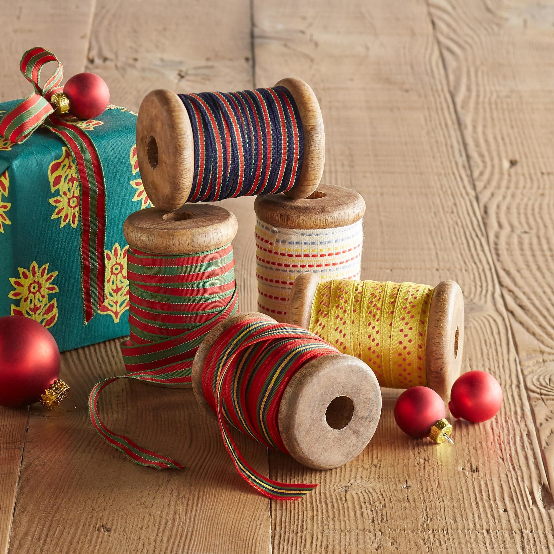 Red Christmas Ribbon on Wooden Spool