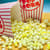 View thumbnail of Buttered Popcorn Jelly Beans in popcorn bucket pouring onto table