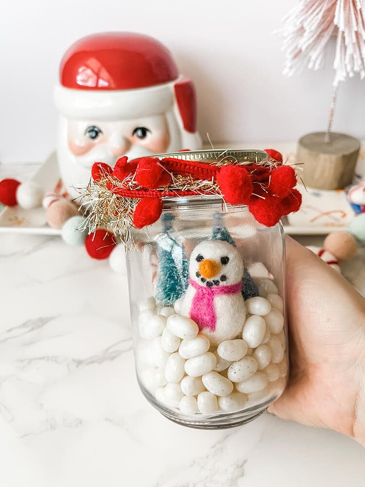 holding the finished Jelly Belly Snow Globe