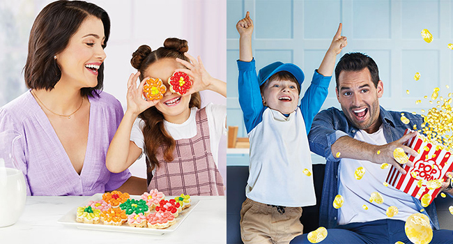 A mother and daughter enjoying sugar cookies topped with jelly beans and a father and son enjoying a movie on the couch while eating Buttered Popcorn jelly beans